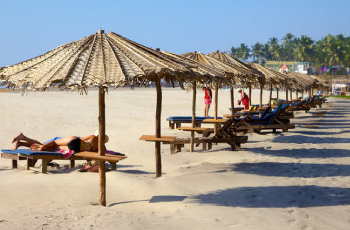 Relax at the serene Ashvem Beach! Book your self-drive Goa car rental today for a hassle-free trip.